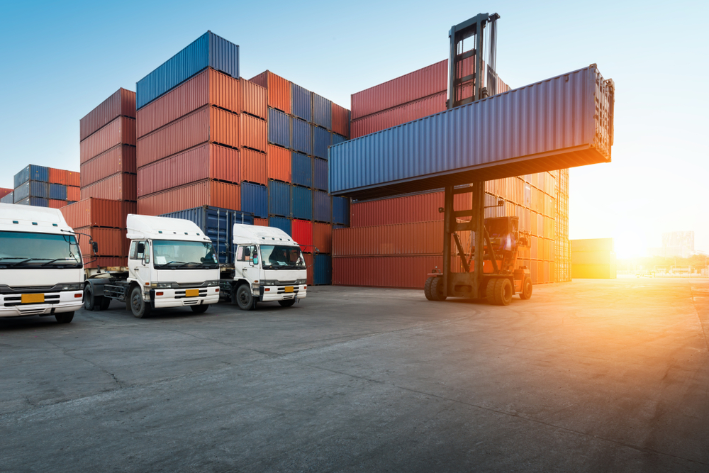 Industrial,Container,Yard,With,Forklift,Working,In,The,Morning,For